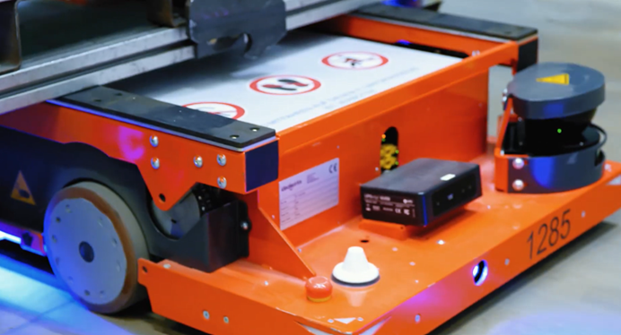 Orange autonomous mobile robot AMR 1285 with LiDAR navigation sensor control panel and safety warning systems for industrial automation material handling and warehouse logistics in smart manufacturing facility